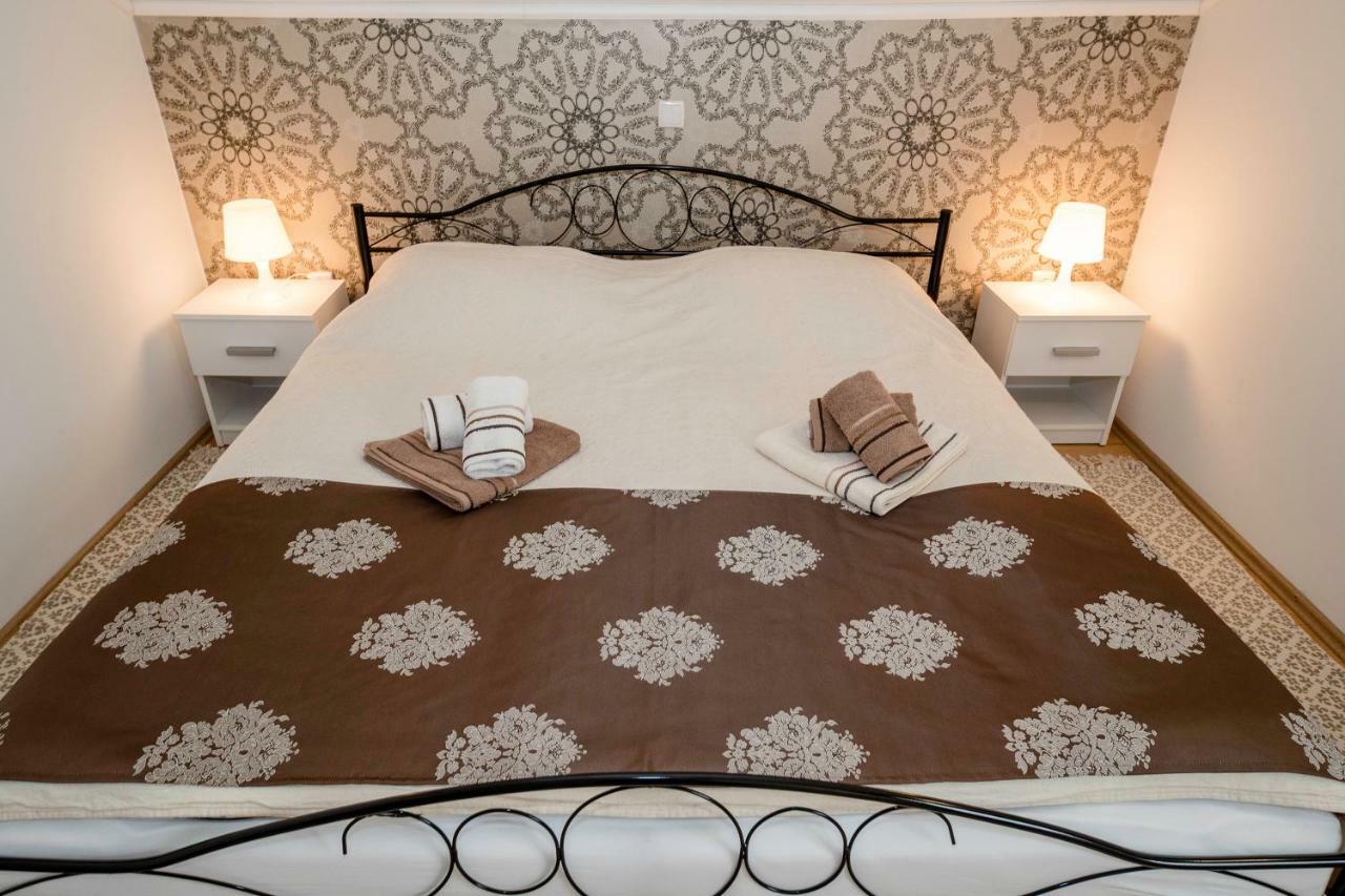 Apartmani Godinic Palit Экстерьер фото